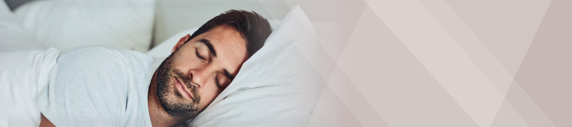 Man sleeping: a snore guard helps you sleep